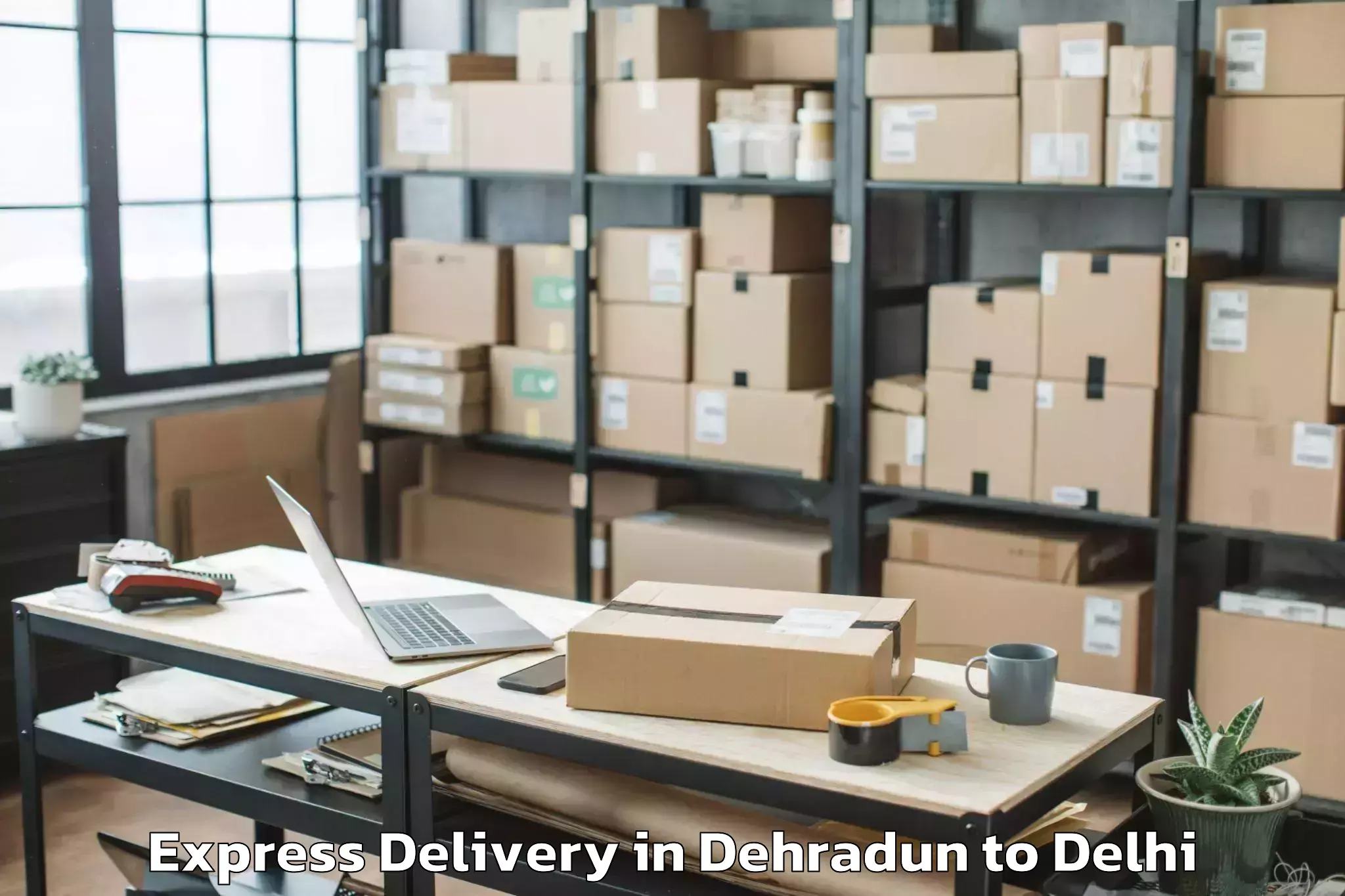 Book Dehradun to Dlf Promenade Mall Express Delivery